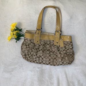 Nude/ brown Coach logo stitched purse/ bag